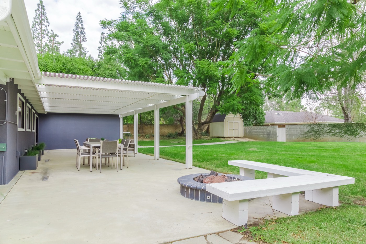 Outdoor patio, fire feature and garden at a New Start CLHF